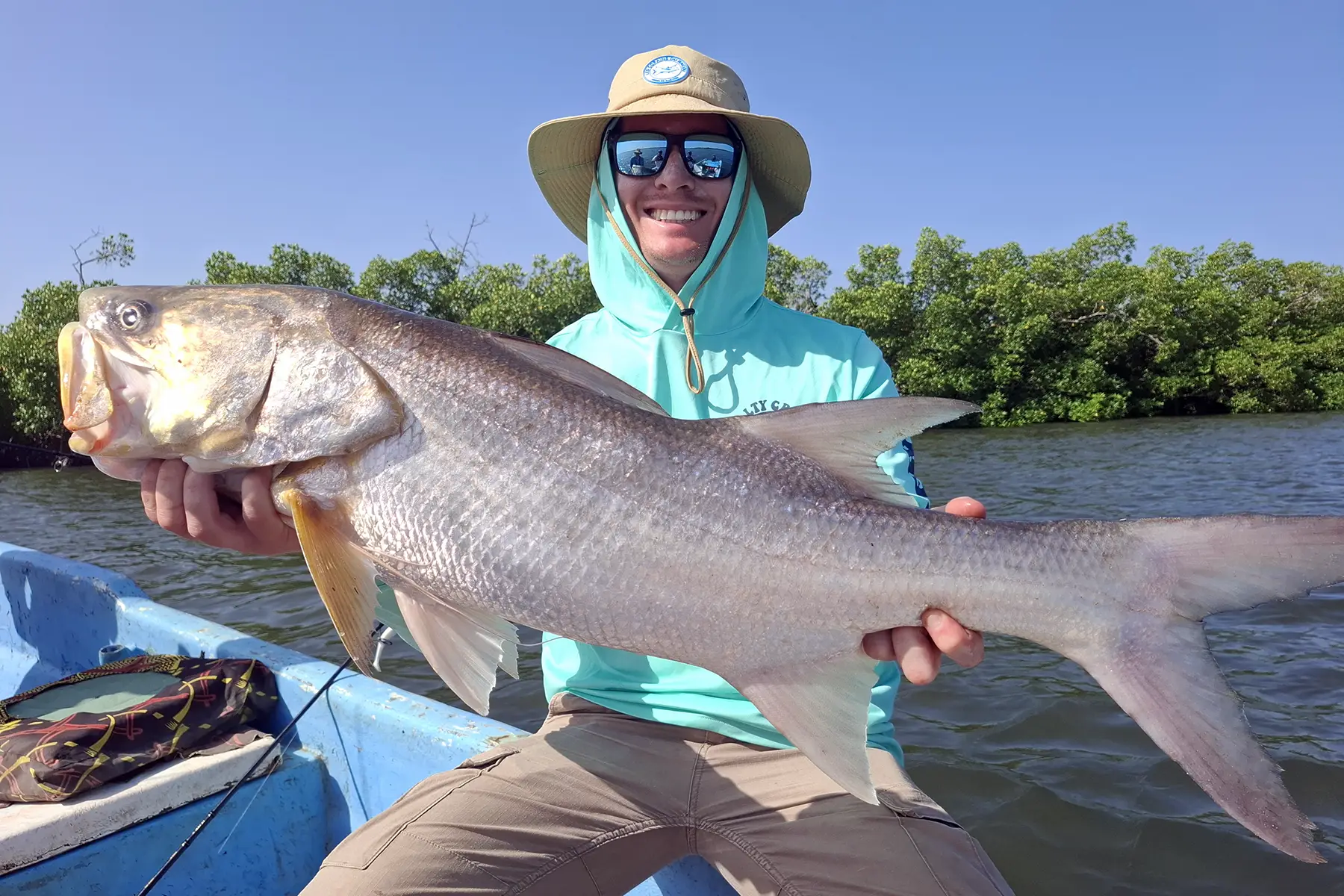 Sport fishing in Senegal, a boat trip through the Casamance mangrove