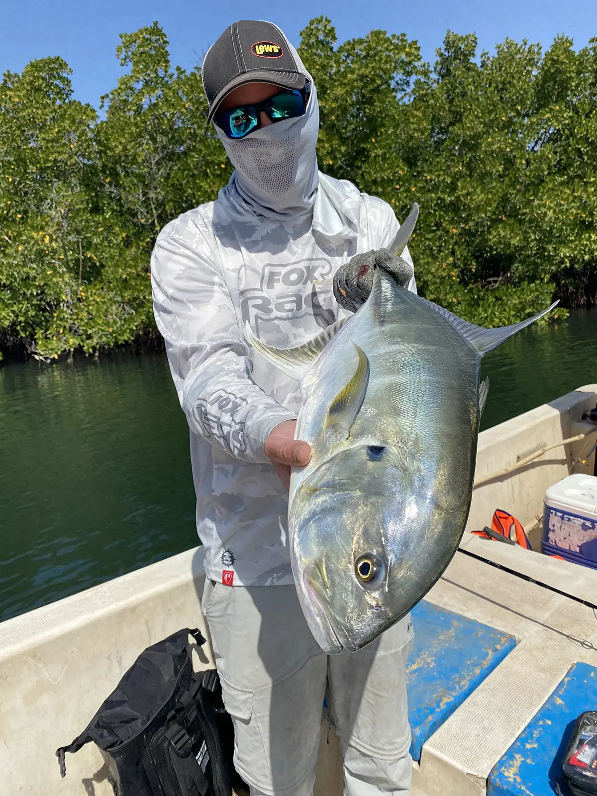 Two anglers and a good-sized threadfin, Abéné mangrove
